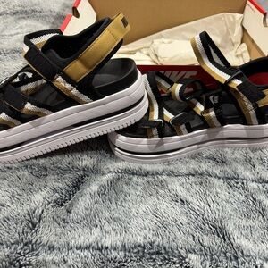Nike Black and Gold Strappy Sandals brand new in box